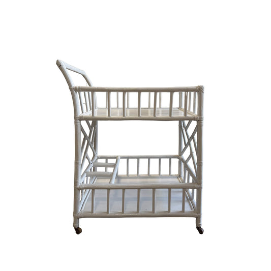 Vintage lacquered bar cart on a white background. High gloss lacquer finish.