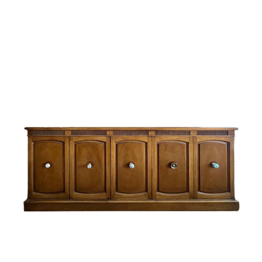 Vintage Drexel buffet with clean contemporary lines, large storage cabinets, and modern silhouette; ready for refinishing with new hardware.
