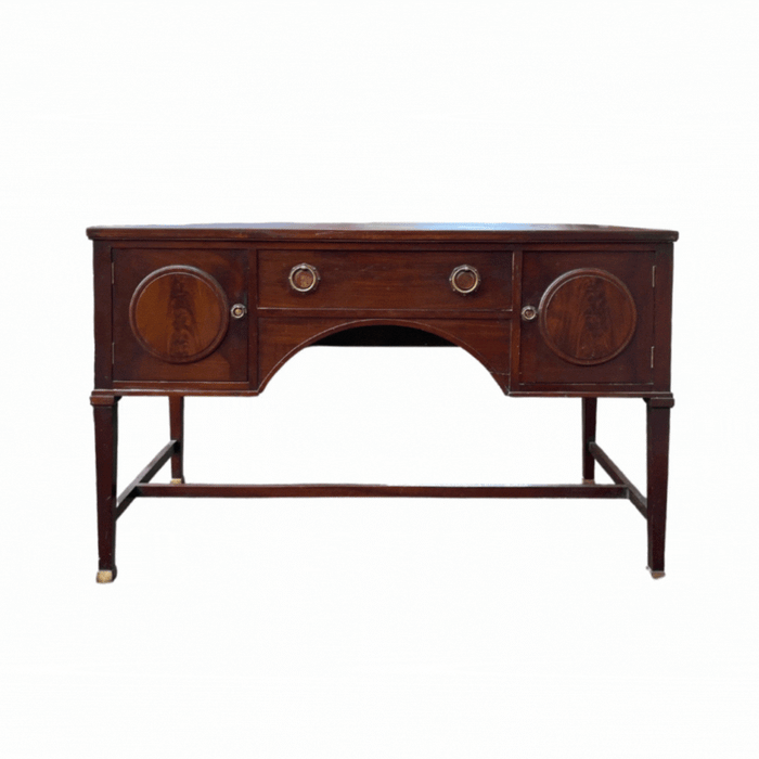 Vintage english desk converted into a buffet. New legs and a fresh black stain, this relic is now revered as a sideboard.