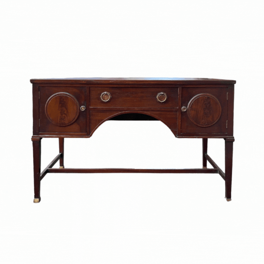 Vintage english desk converted into a buffet. New legs and a fresh black stain, this relic is now revered as a sideboard.