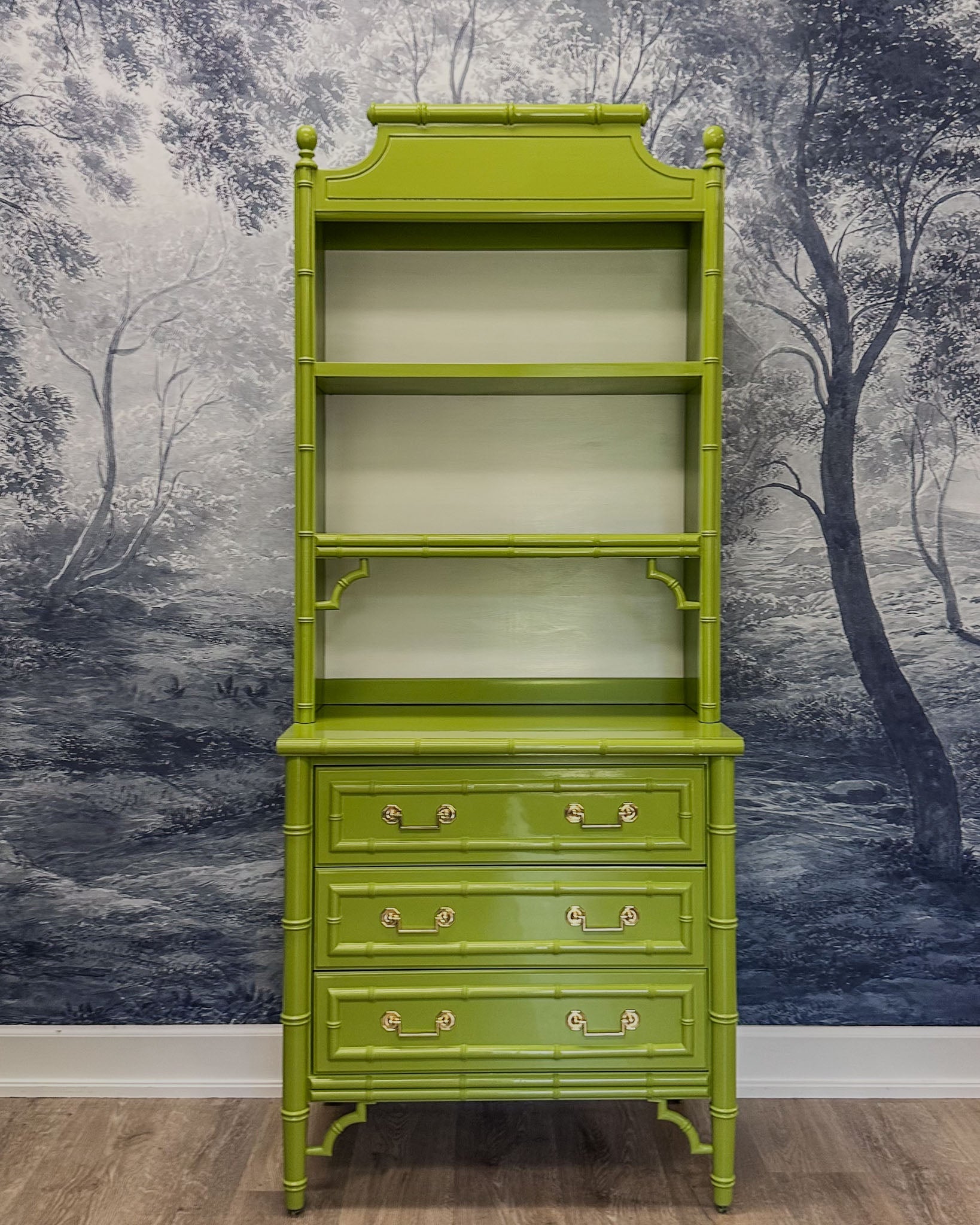 Vintage faux bamboo dresser with upper hutch, refinished in glossy olive green lacquer. Features three drawers and three open shelves with updated vintage-style brass hardware.