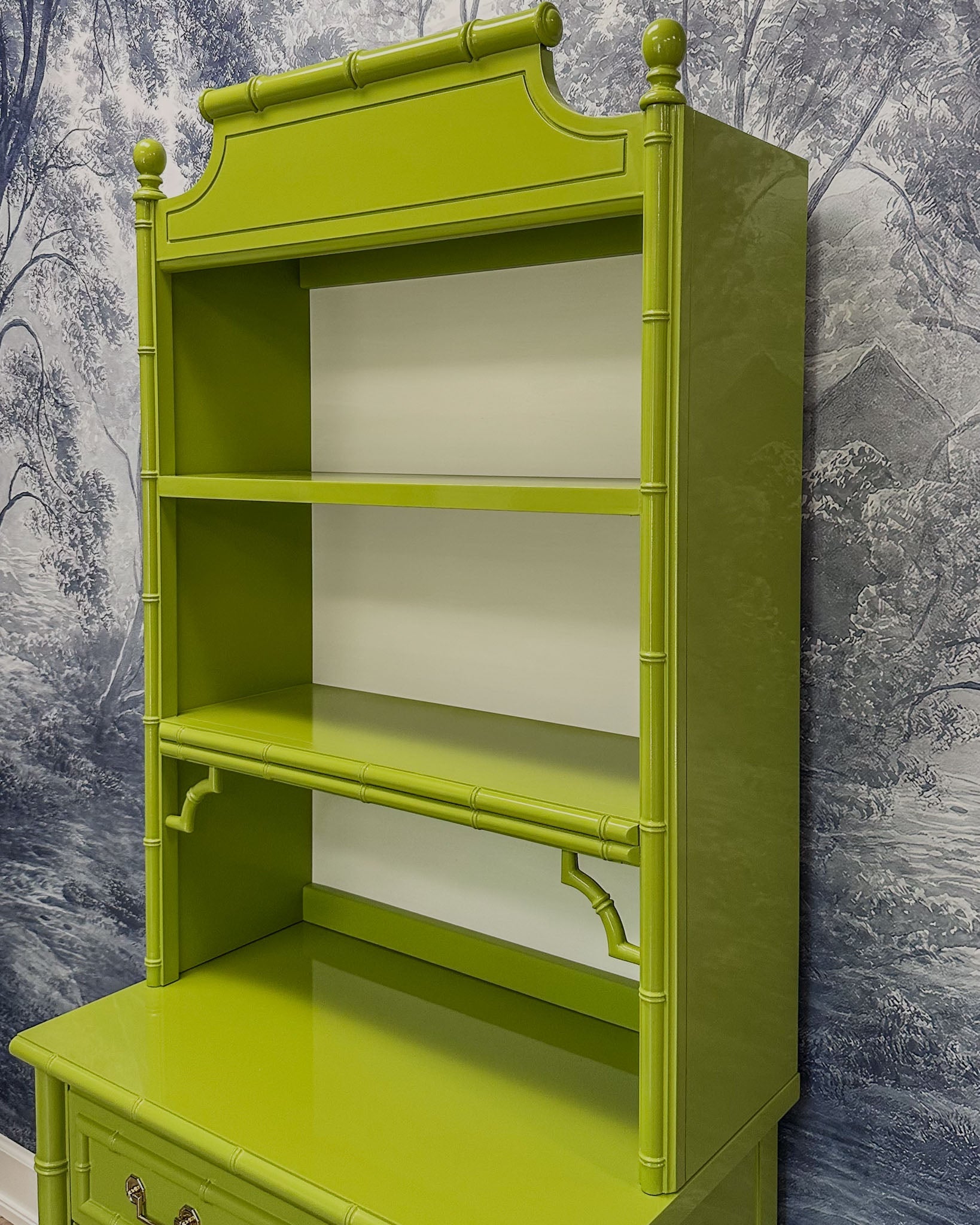 Vintage faux bamboo dresser with upper hutch, refinished in glossy olive green lacquer. Features three drawers and three open shelves with updated vintage-style brass hardware.