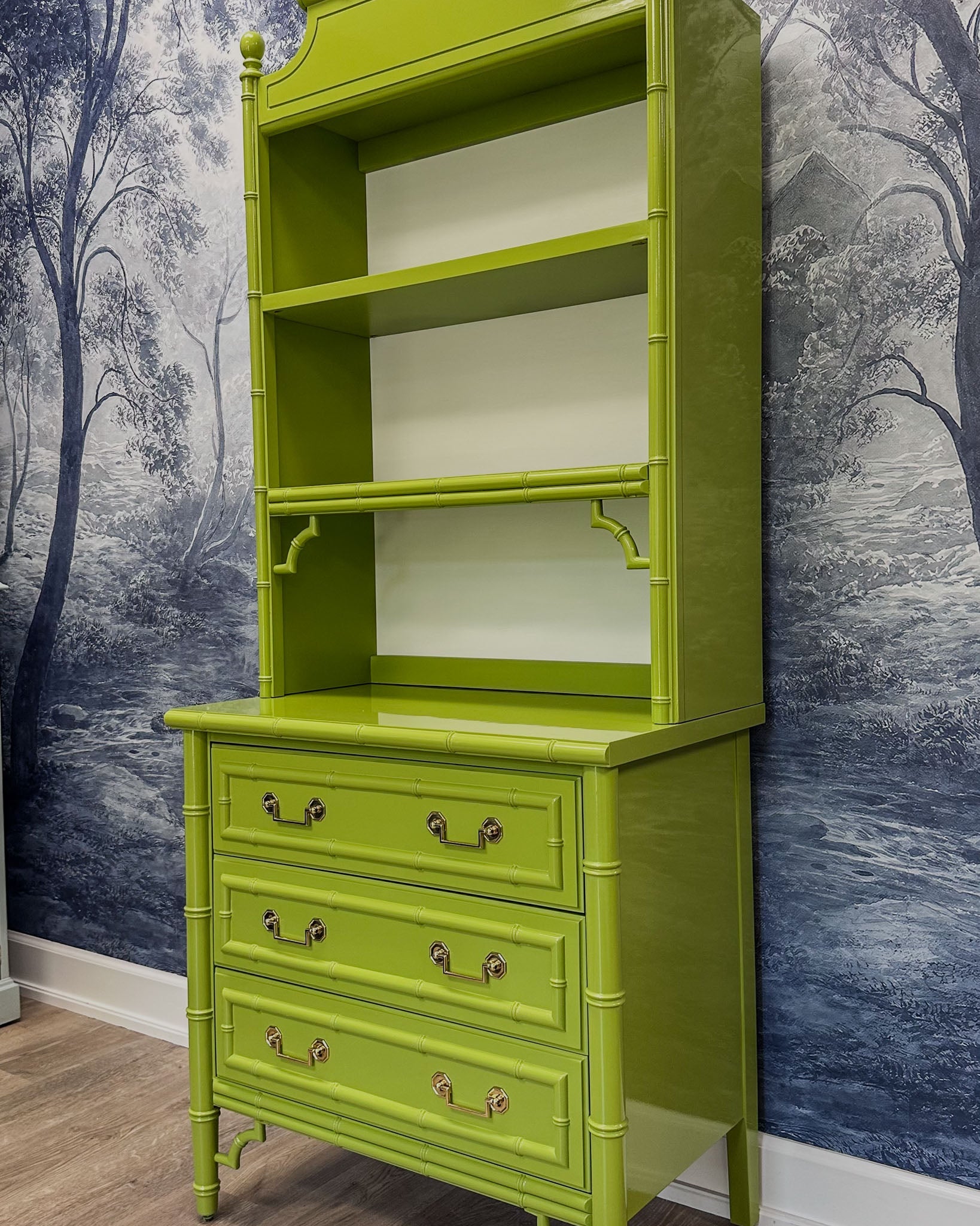 Vintage faux bamboo dresser with upper hutch, refinished in glossy olive green lacquer. Features three drawers and three open shelves with updated vintage-style brass hardware.