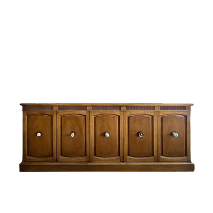 Vintage Drexel buffet with clean contemporary lines, large storage cabinets, and modern silhouette; ready for refinishing with new hardware.